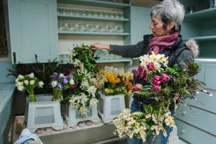 Rachel arranging flowers in studio